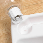 Two-in-one white pet feeder and water bowl corner design