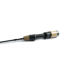 Angler using winter fishing rod with interchangeable tips on frozen lake